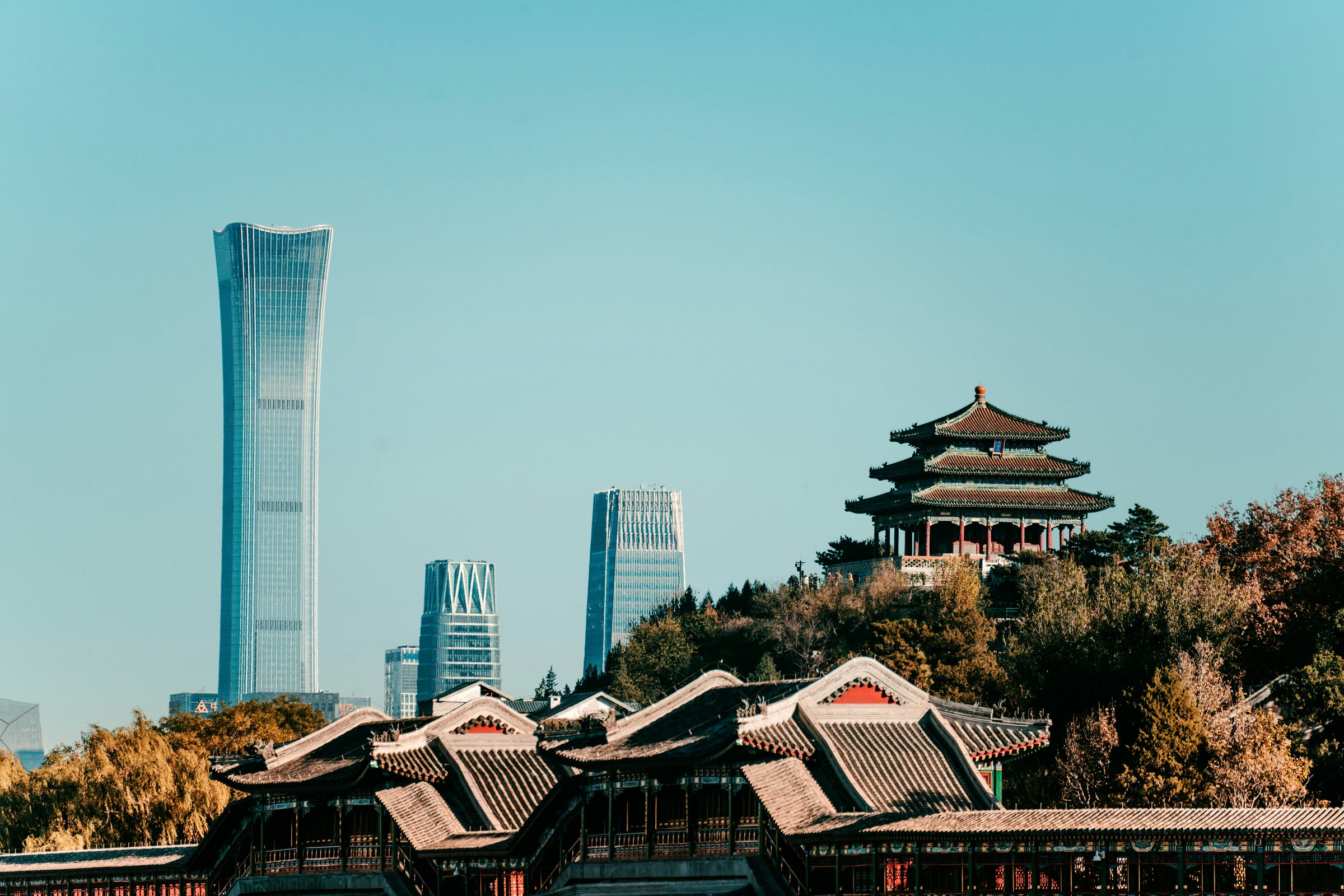 Beijing skyline with traditional roofs in the foreground