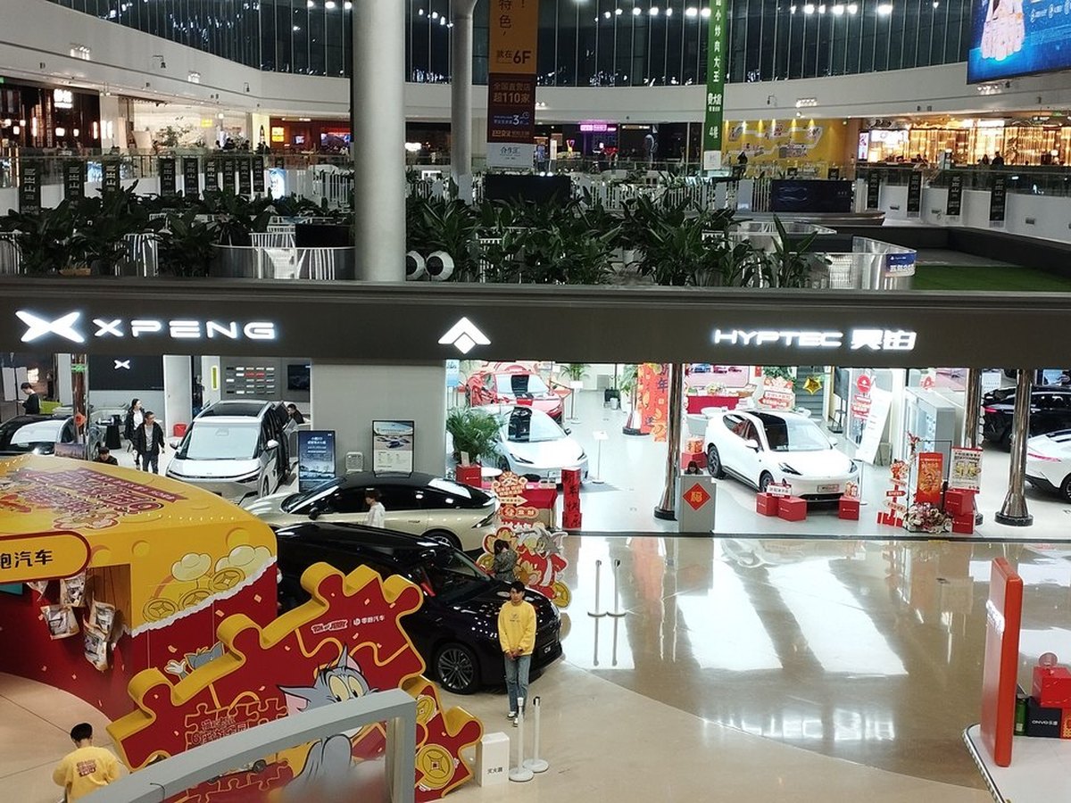 Vehicles on display in a Chinese manufacturing showroom